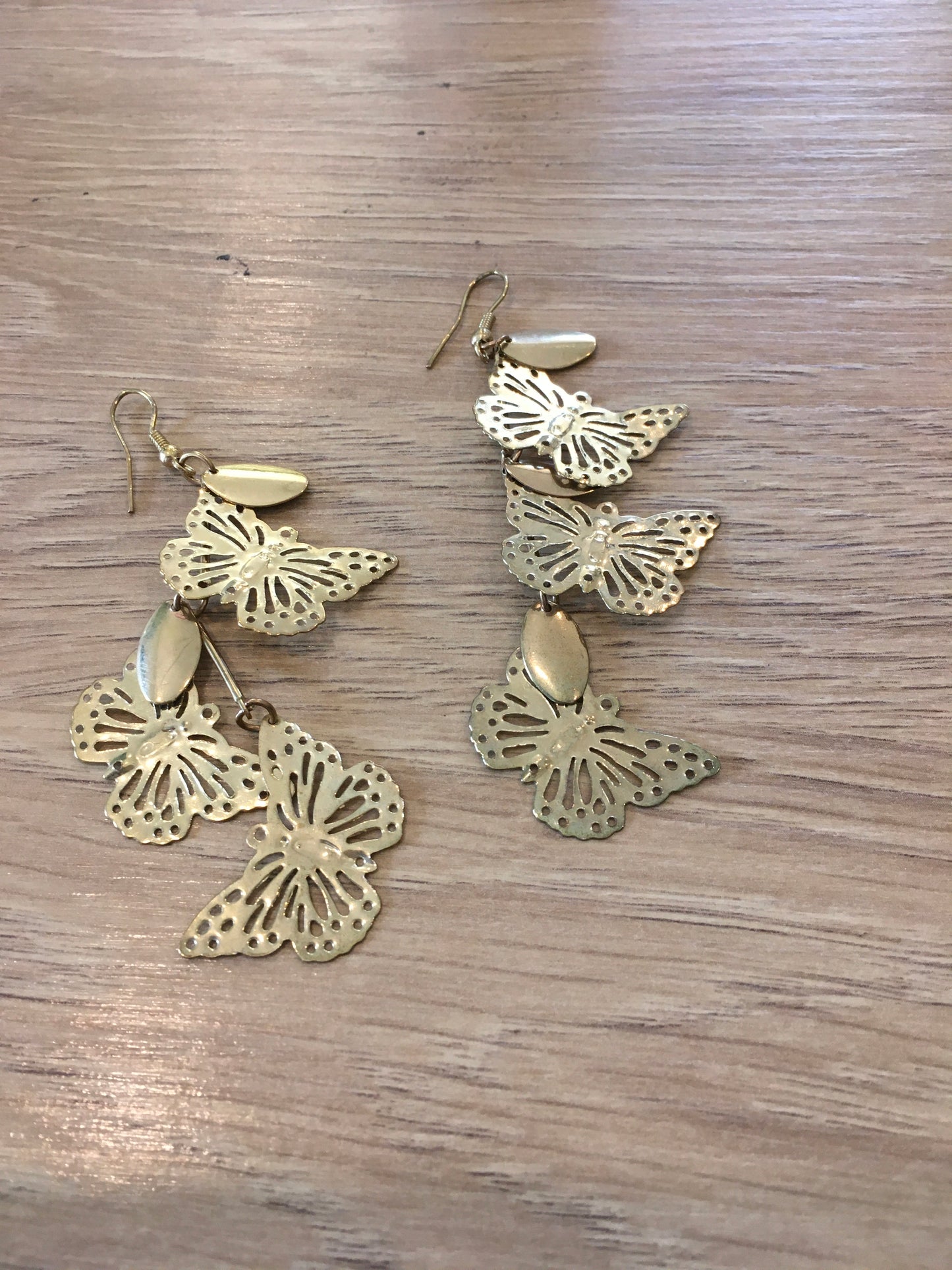 Gold laser cut butterfly dangle earring