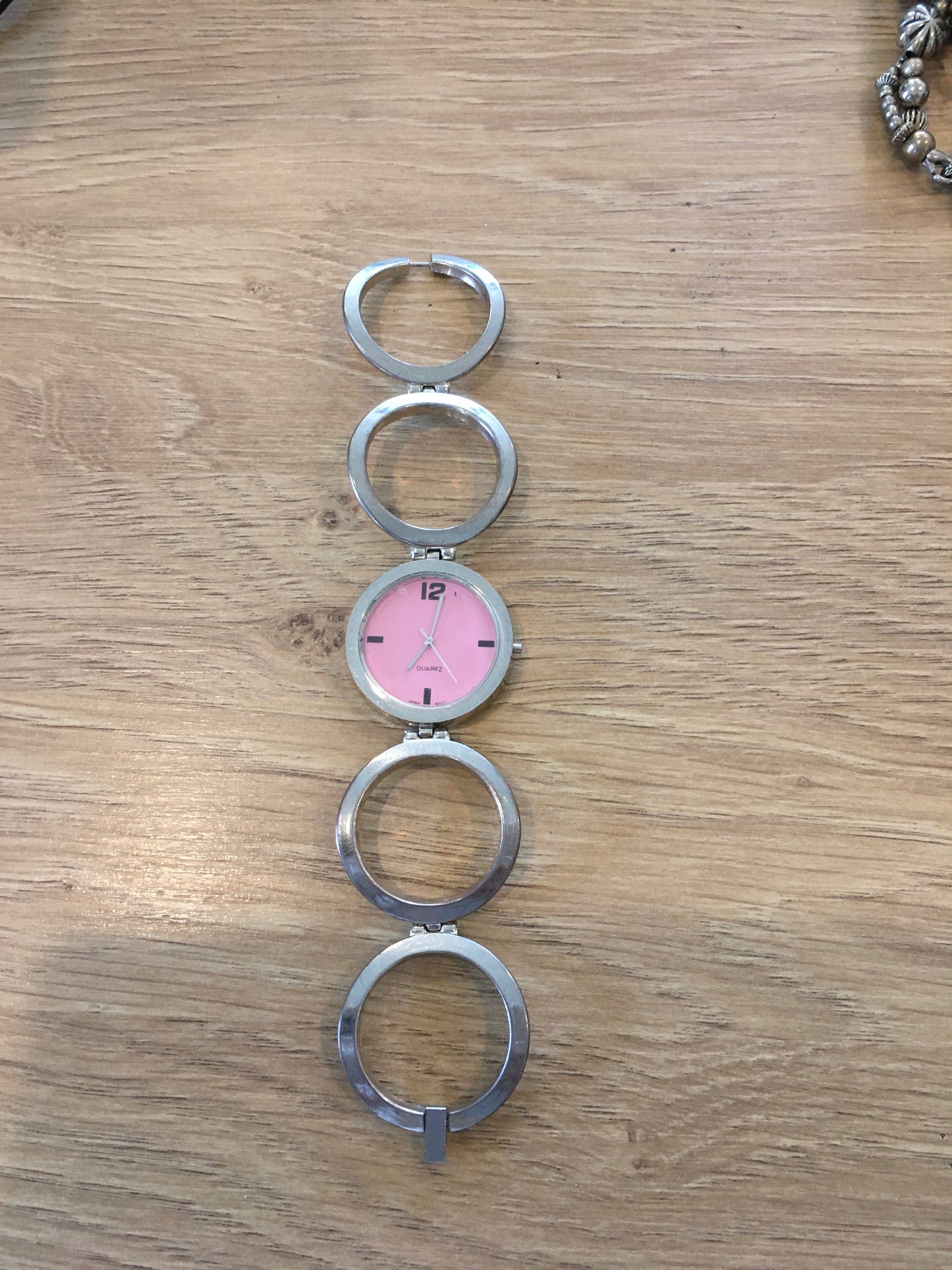 Silver pink face large open circle chain fashion watch (not operating)