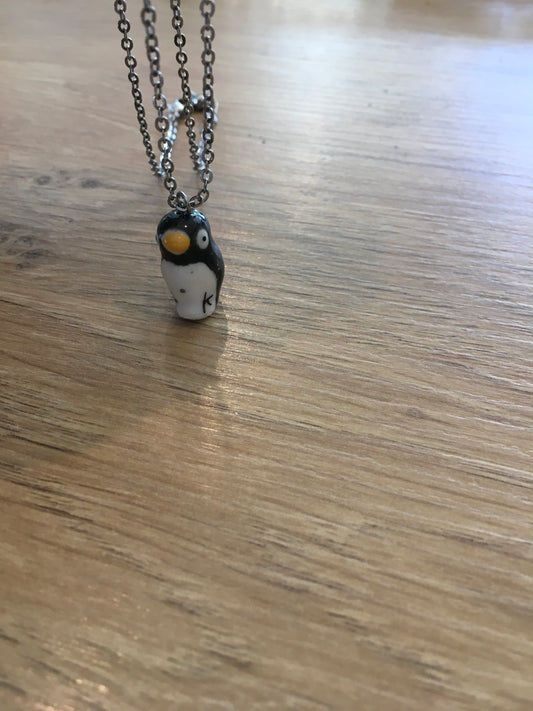 Ceramic penguin pendant on silver chain