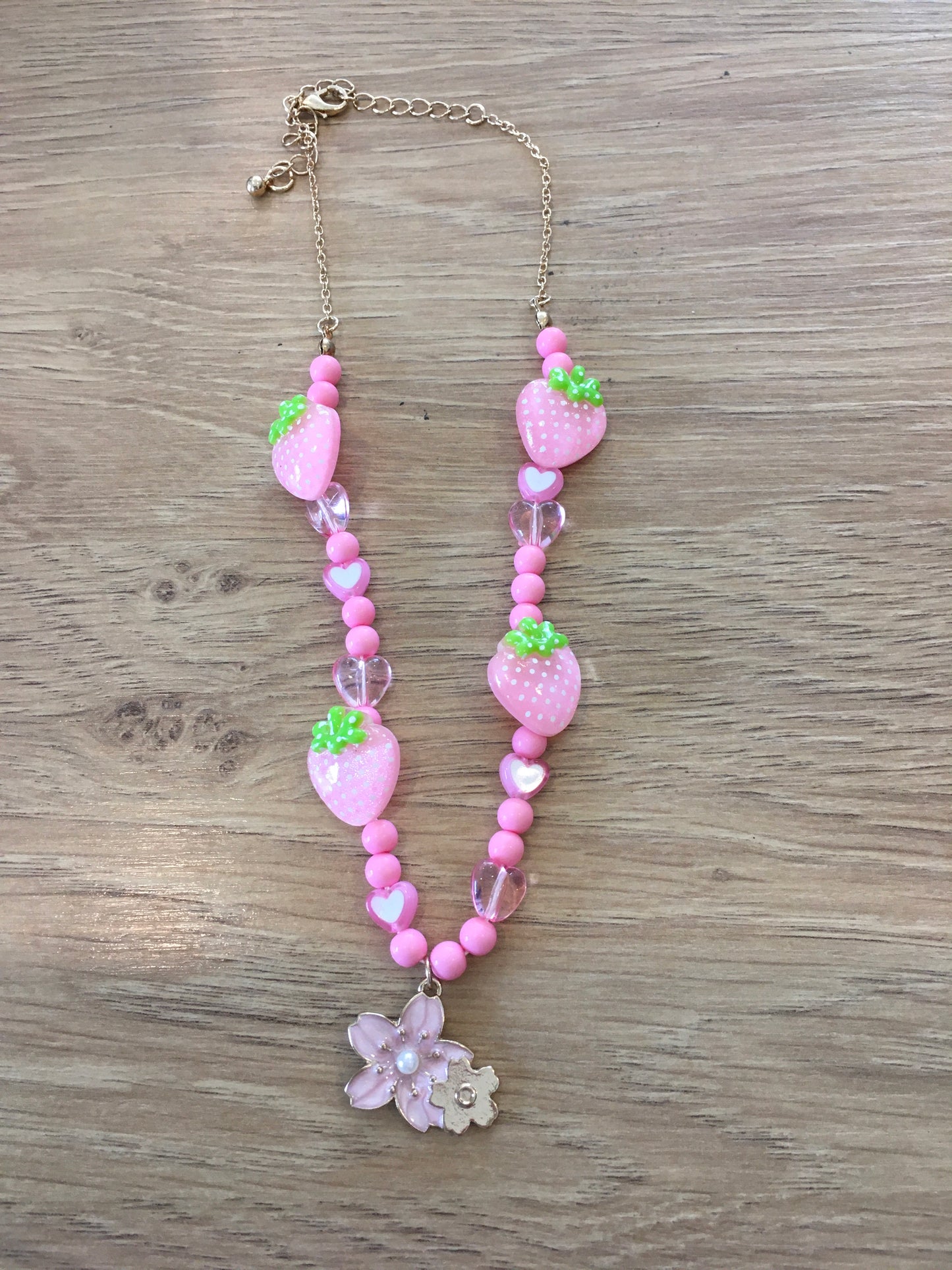 Pink strawberry bead necklace